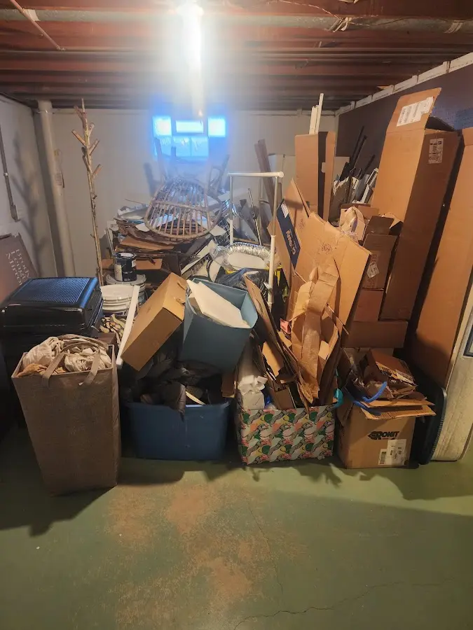 Roll-off dumpster container at job site for 4 Yard Dumpster Rental in Jefferson City